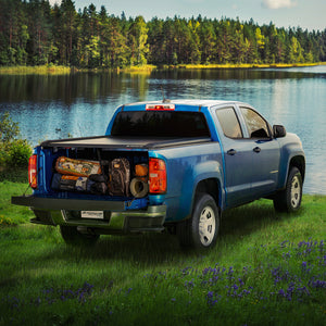 Blue chevy Colorado truck with a Mountain Top Retractable Truck Bed Cover